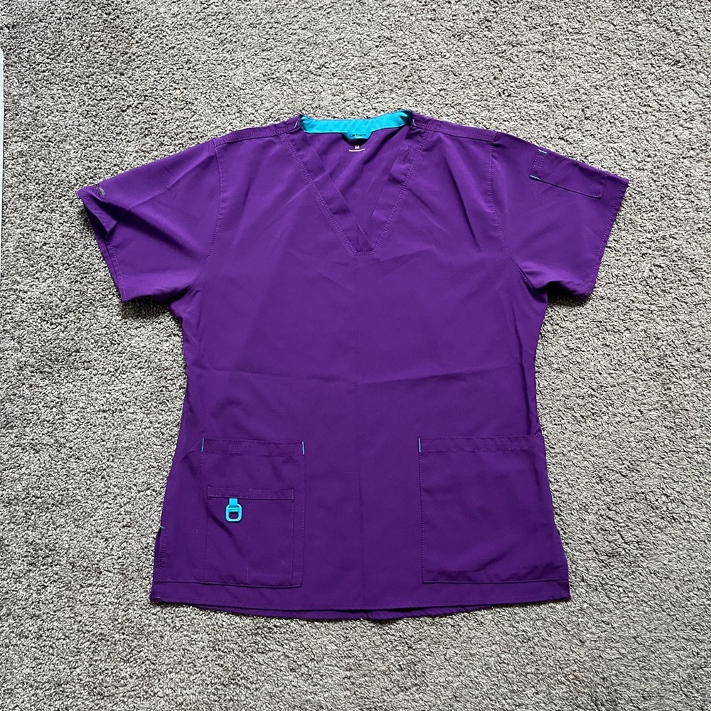 Bundle of medium scrub tops